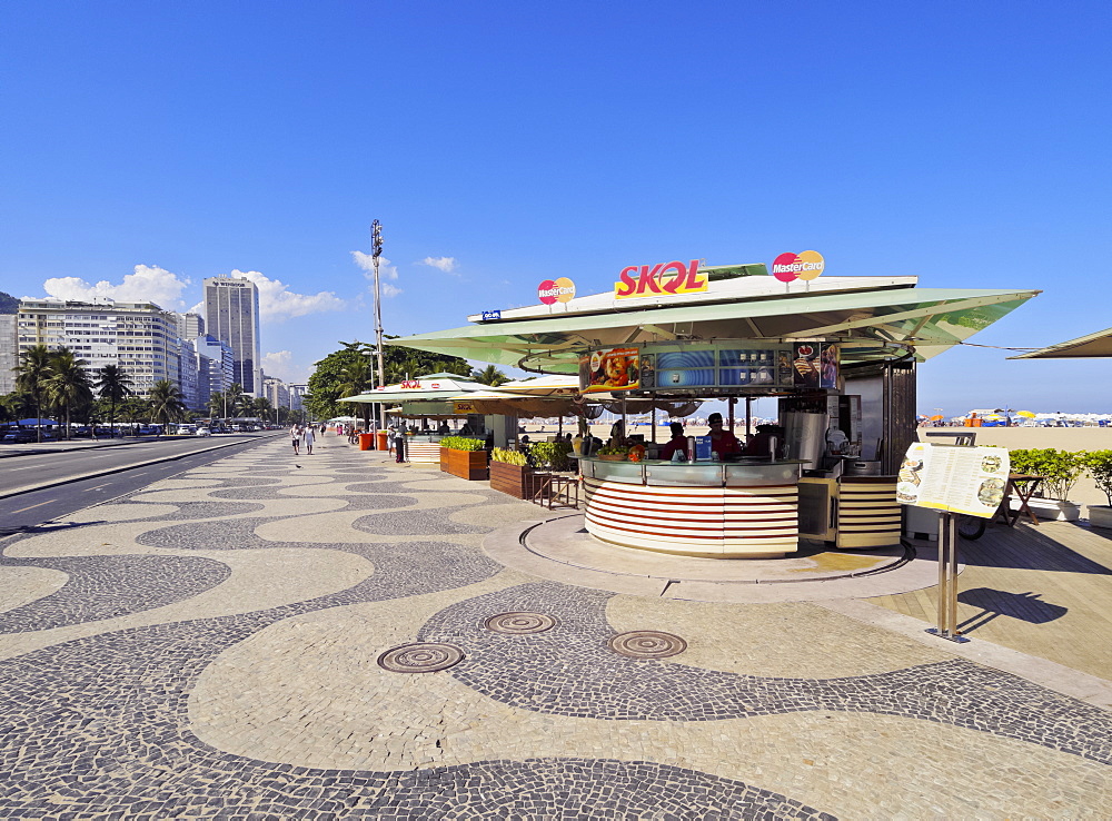 Portuguese wave pattern pavement and beach bar at Copacabana, Rio de Janeiro, Brazil, South America