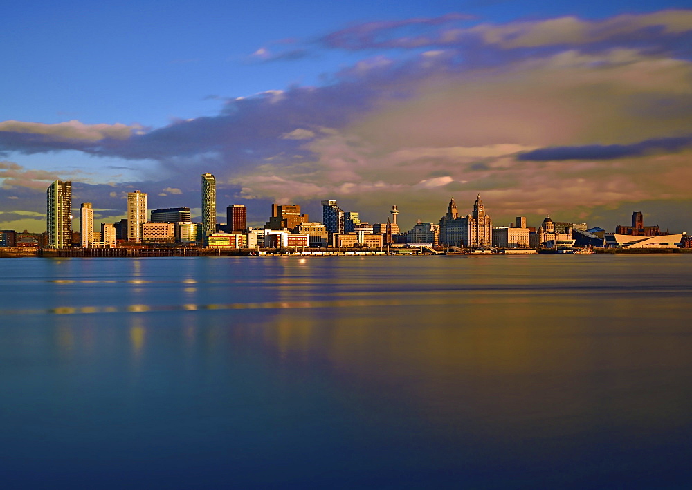 An evening view looking across the River Mersey of Liverpool Waterfront, Liverpool, Merseyside, England, United Kingdom, Europe