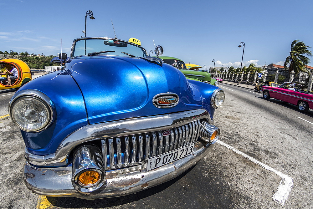 Old Cuban taxi waiting for a tourist, Havana, Cuba, West Indies, Central America