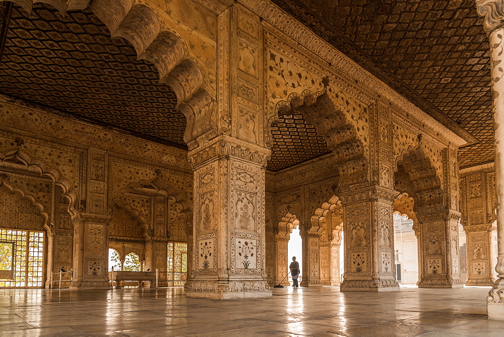 A cleaner mopping the floor at The Red Fort, UNESCO World Heritage Site, Old Delhi, India, Asia