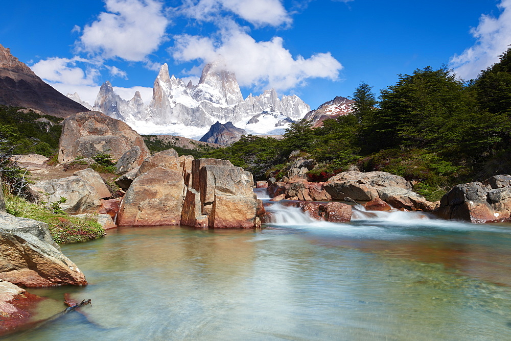 Wide angle long exposure landscape featuring Monte Fitz Roy in the background and clear water river in the foreground, Patagonia, Argentina, South America