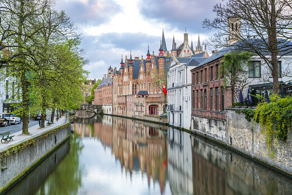 Houses and bridge reflected in the Groenerei canal, Bruges, West Flanders province, Flemish region, Belgium, Europe