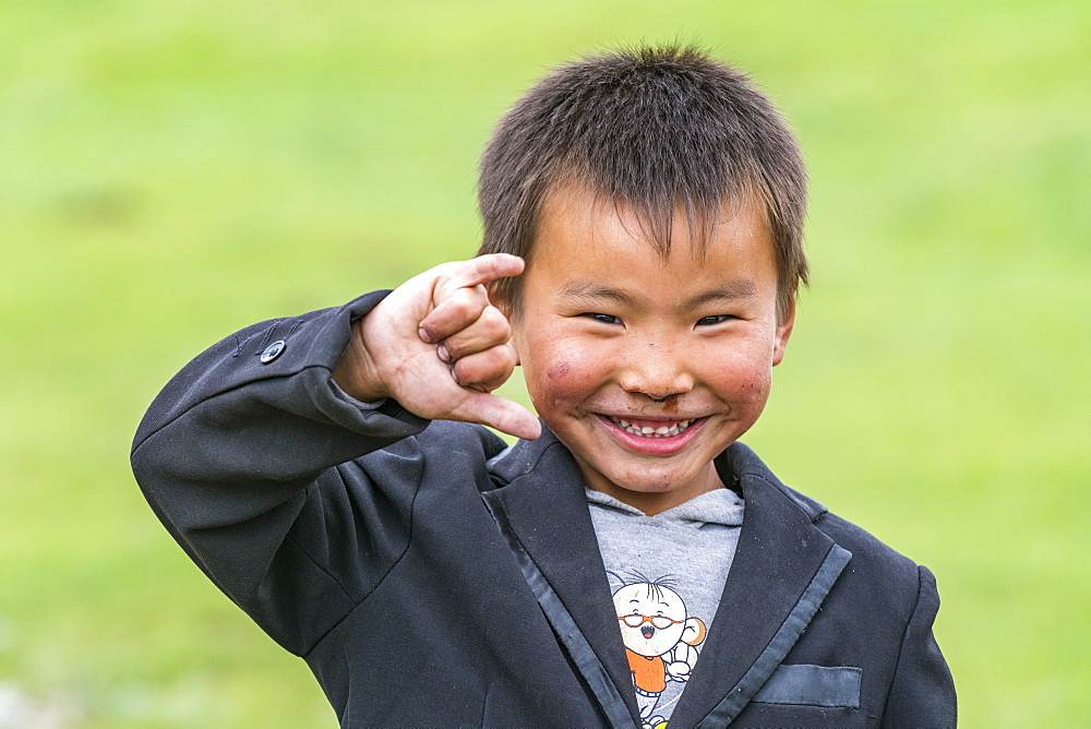 Portrait of a Mongolian nomadic little boy, North Hangay province, Mongolia, Central Asia, Asia