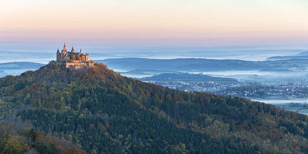 Hohenzollern Castle in autumnal scenery at dawn, Hechingen, Baden-Wurttemberg, Germany, Europe