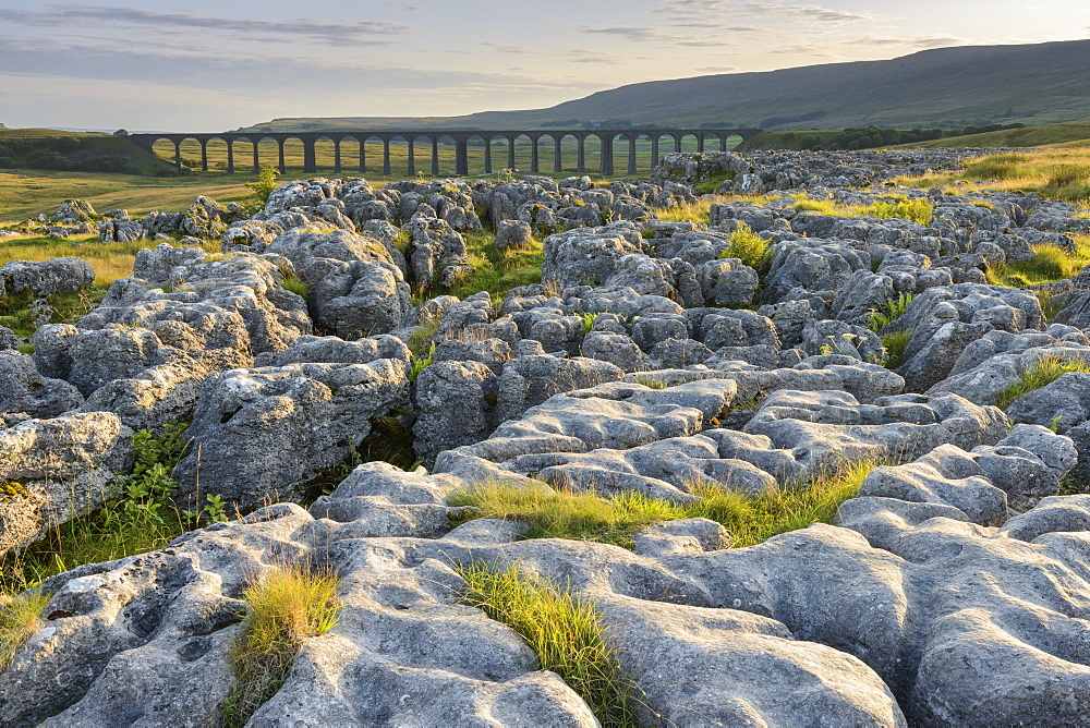 Limestone pavements and the Ribblehead Viaduct in the Yorkshire Dales, Yorkshire, England, United Kingdom, Europe