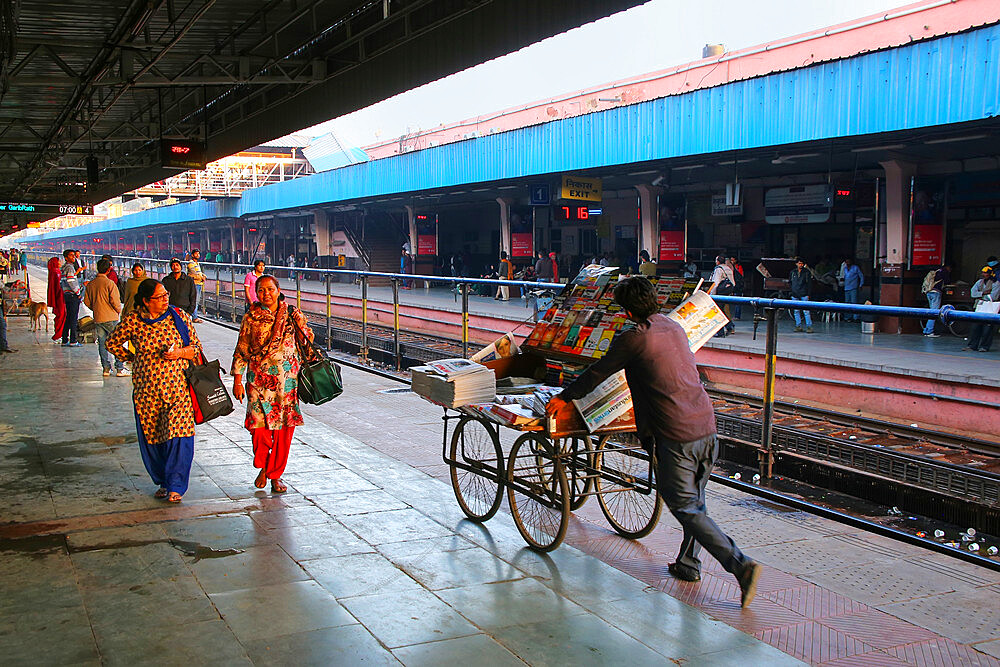 People walking on the platform at Jaipur Junction Railway Station in Rajasthan, India, Asia