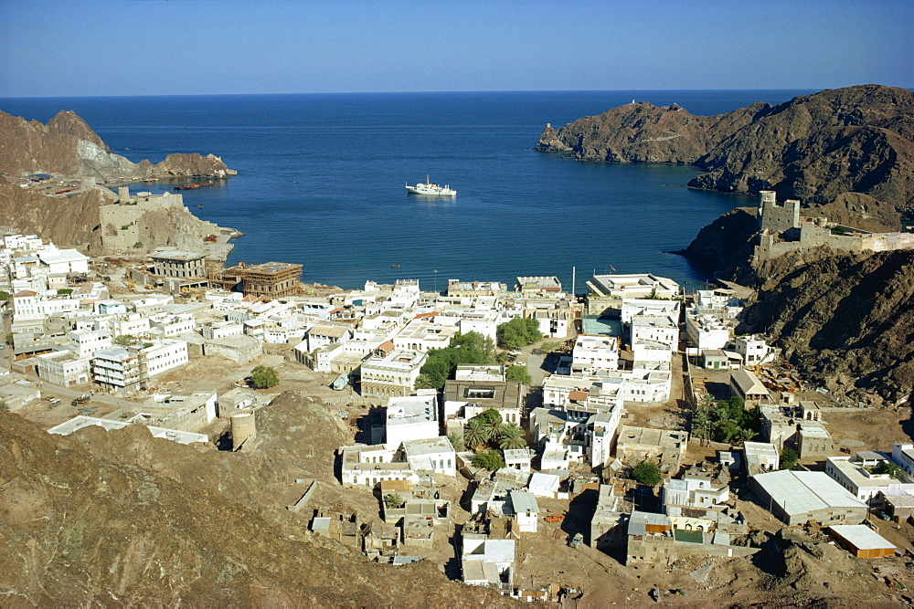 Aerial view over the harbour at Muscat, protected by the Merani Fort on left, and the Jalai Fort on right, Oman, Middle East