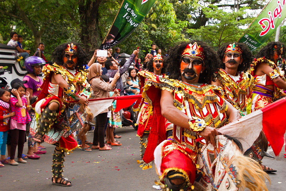 Indonesian men taking part in a carnival celebrating Malang's 101st year anniversary, Malang, East Java, Indonesia, Southeast Asia, Asia