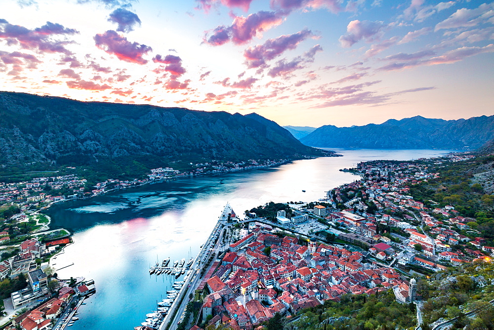 Looking over the Old Town of Kotor and across the Bay of Kotor viewed from the fortress at sunset, UNESCO World Heritage Site, Montenegro, Europe