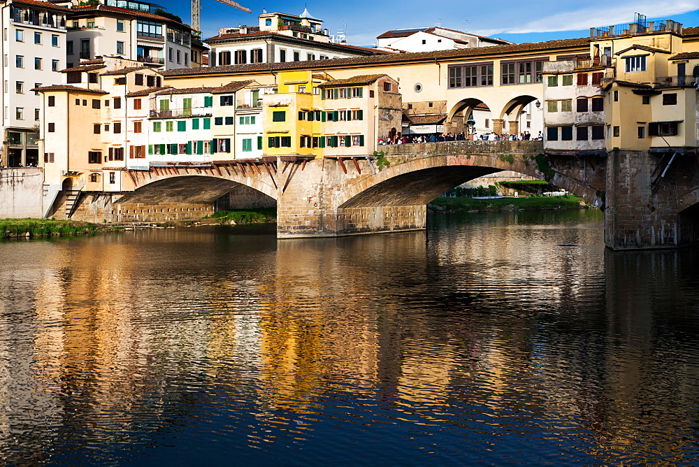 Ponte Vecchio reflected in the Arno River, Florence, UNESCO World Heritage Site, Tuscany, Italy, Europe