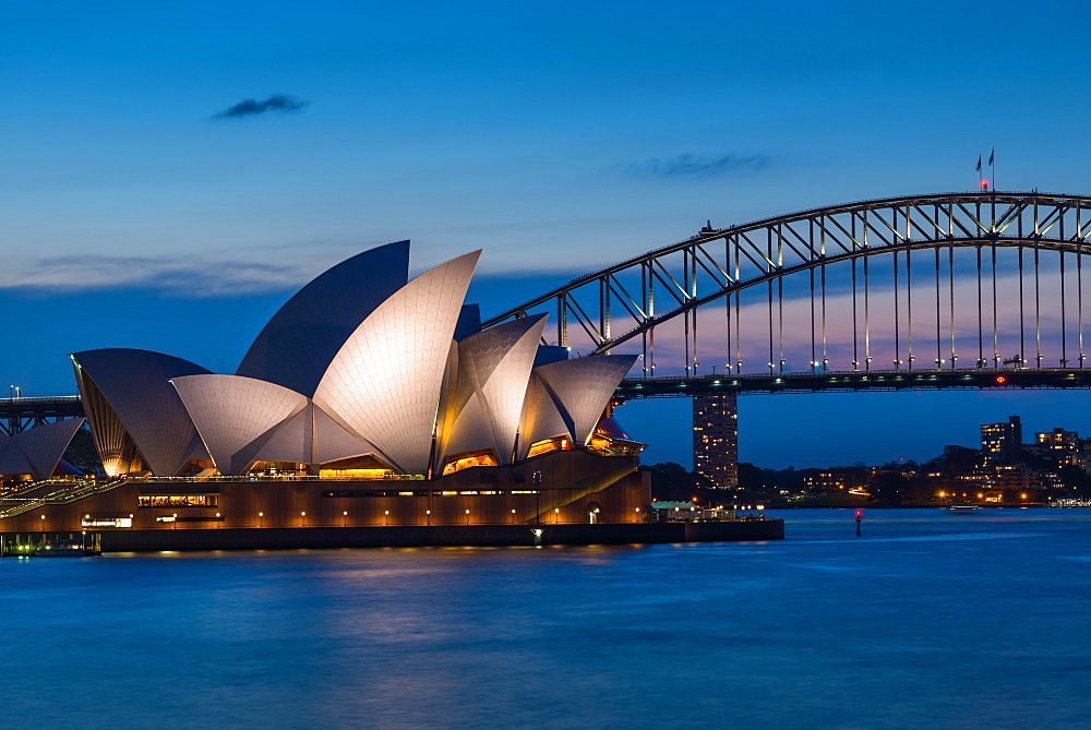 Sydney Opera House, UNESCO World Heritage Site, and Harbour Bridge after sunset, Sydney, New South Wales, Australia, Pacific