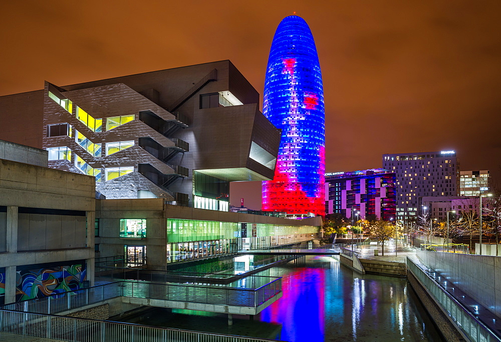 Disseny Hub Barcelona and skyscraper Torre Agbar illuminated after dark, architect Jean Nouvel, Barcelona, Catalonia, Spain, Europe