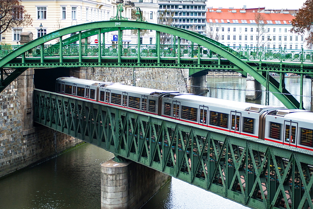 U-Bahn train on Zollamtssteg Arch Bridge with Zollamtsbrucke Truss Bridge, Vienna, Austria, Europe