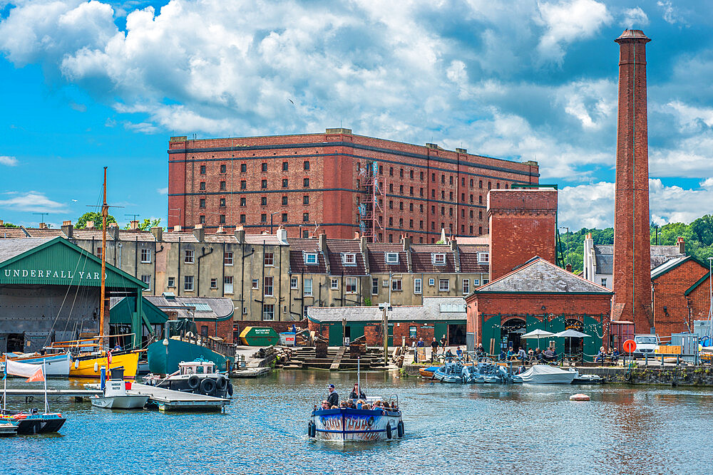 Floating Harbour at Underfall Yard with Victorian pump room and an old tobacco warehouse to the rear, Bristol, Avon, England, United Kingdom, Europe