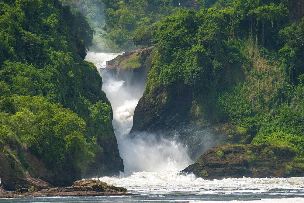 Water cascades down Murchison Falls and into the River Nile, Uganda, Africa