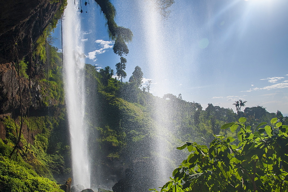 Looking out from under Sipi Falls, Uganda, Africa