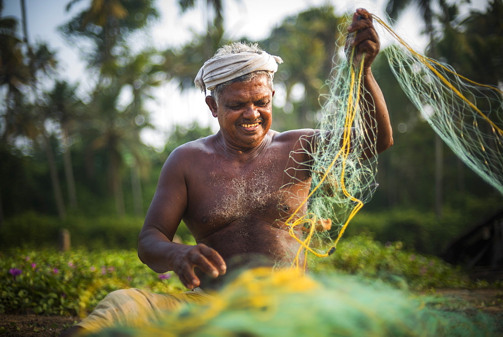 Fisherman at Kappil Beach, Varkala, Kerala, India, Asia