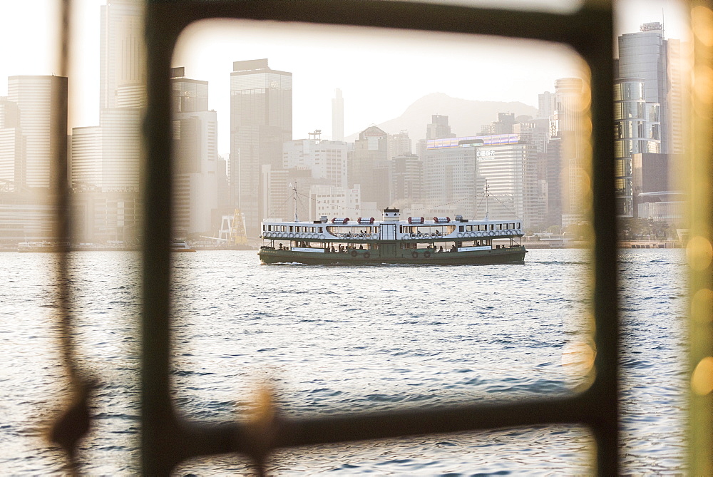 Star Ferry at sunset, between Hong Kong Island and Kowloon, Hong Kong, China, Asia