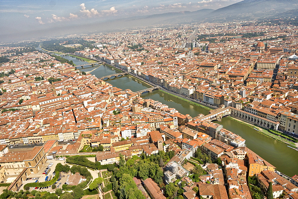 Aerial view of Florence with in the foreground Ponte Vecchio, Palazzo Vecchio and Cattedrale di Santa Maria del Fiore, Florence, Tuscany, Italy, Europe