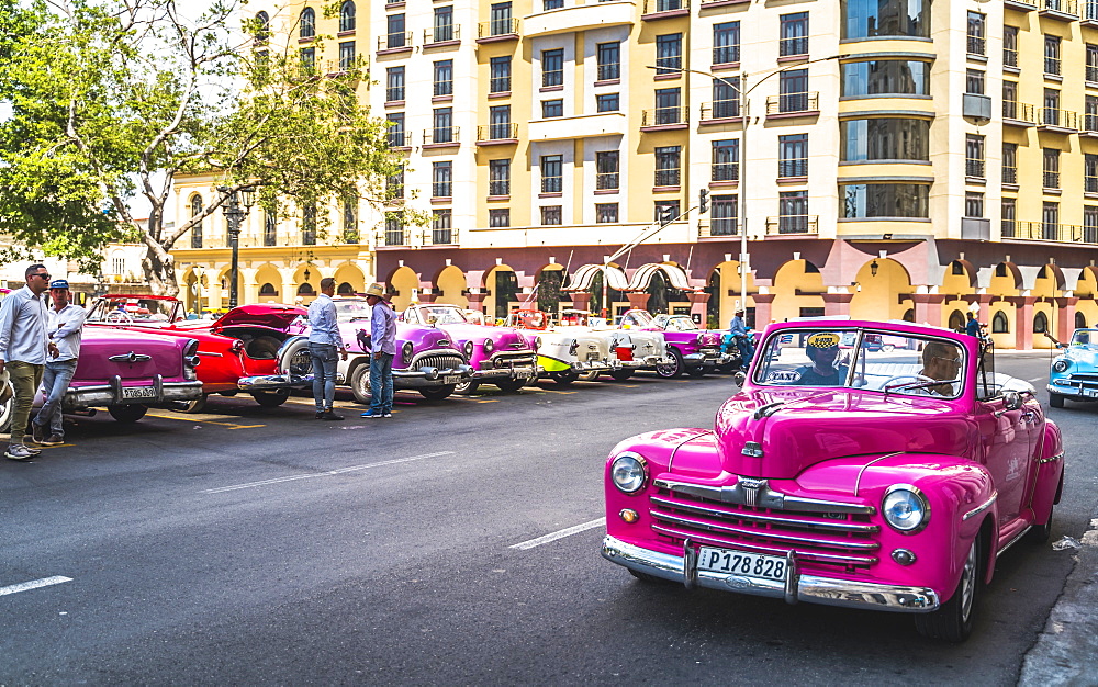 Colourful old American taxi cars parked in Havana, La Habana, Cuba, West Indies, Caribbean, Central America