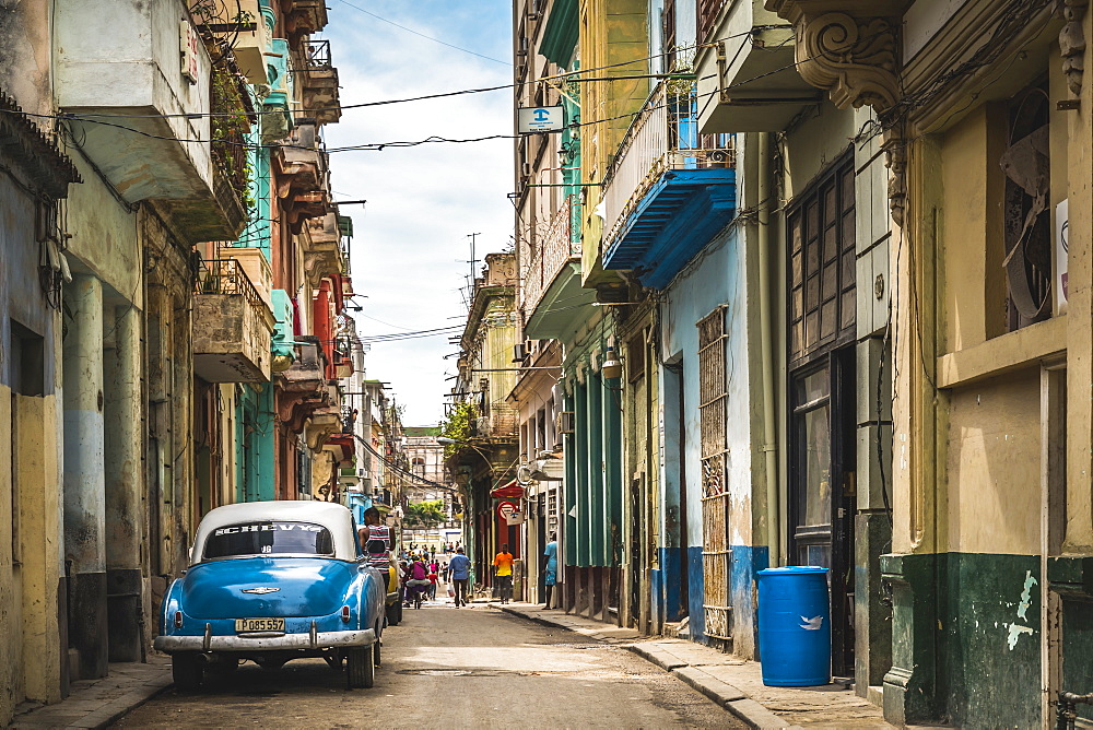 Blue vintage car parked on old colourful street in La Habana, Havana, Cuba, West Indies, Caribbean, Central America