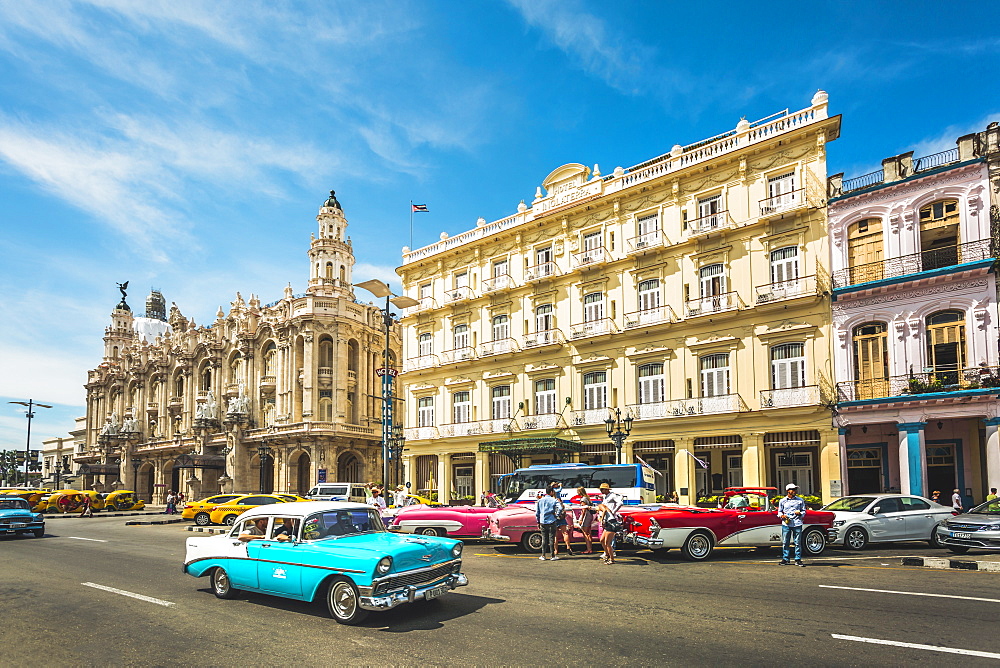 Colourful old American taxi cars outside the Gran Teatro de La Habana, Havana, Cuba, West Indies, Caribbean, Central America