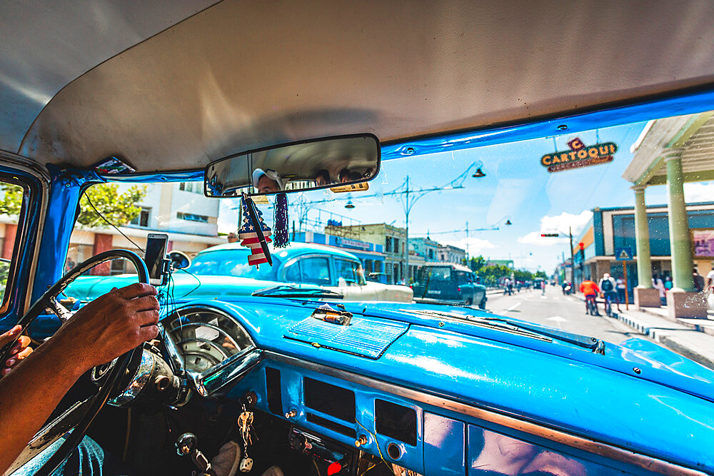 View from taxi in Cienfuegos, UNESCO World Heritage Site, Cuba, West Indies, Caribbean, Central America