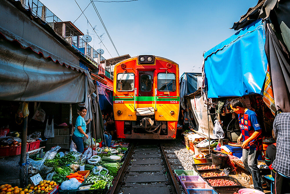 Train going through Maeklong Railway Market, Bangkok, Thailand, Southeast Asia, Asia