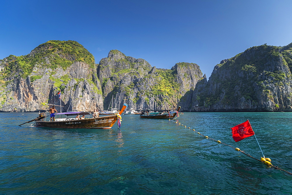 Maya Bay The Beach with long-tail boats and tourists, Phi Phi Lay Island, Krabi Province, Thailand, Southeast Asia, Asia