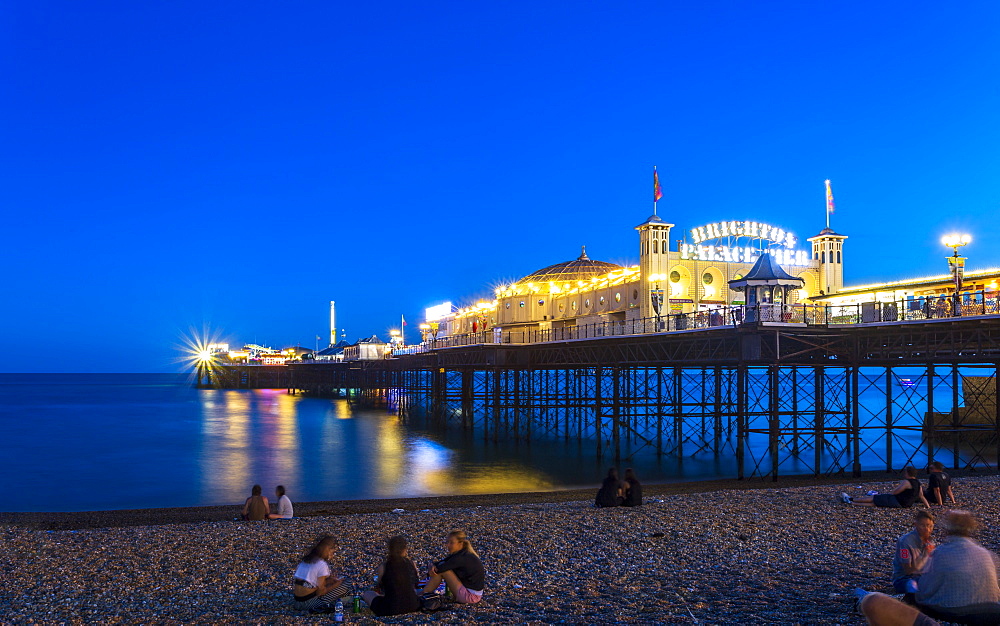 Brighton Palace Pier and beach at night, East Sussex, England, United Kingdom, Europe