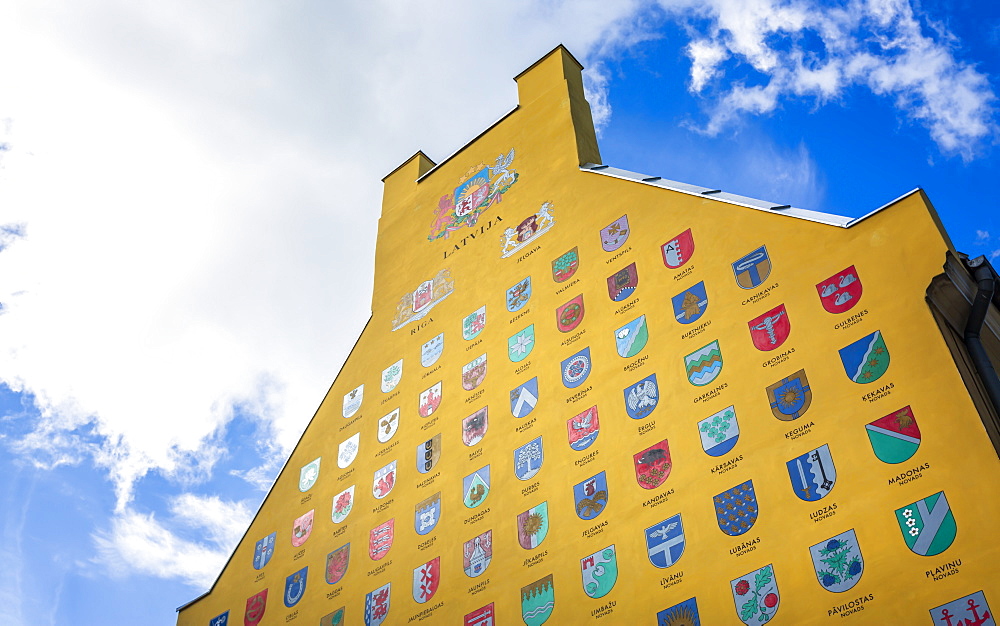 Gable, mural painting with various Latvian city crests in the historic Old Riga, Latvia, Baltic States, Europe