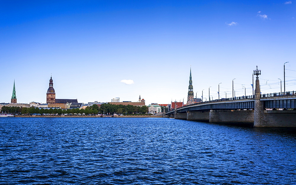 Church of St. Peter and the Old Town from across the River Daugava, Riga, Latvia, Baltic States, Europe