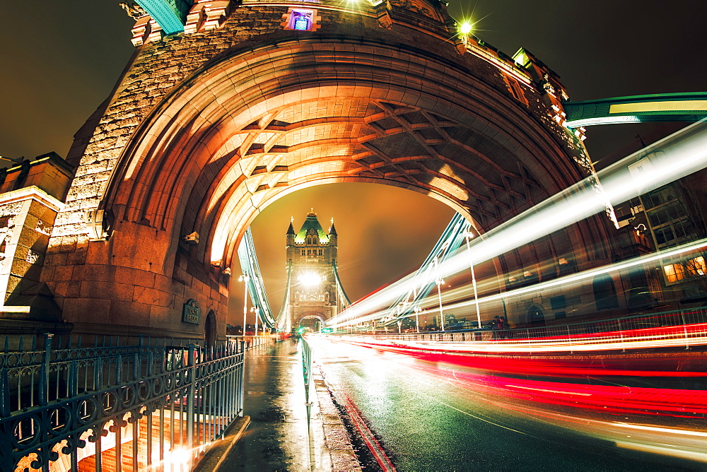 Fisheye view of traffic trail lights on Tower Bridge at night, Southwark, London, England, United Kingdom, Europe