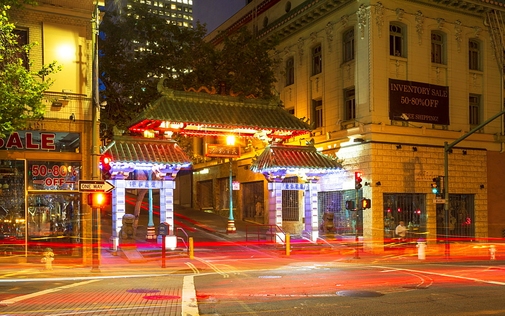 Dragon's Gate and car trail lights at night, Chinatown, San Francisco, California, United States of America, North America