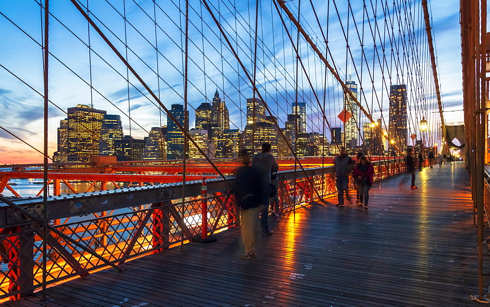 Manhattan skyline from the Brooklyn Bridge at night, New York, United States of America, North America