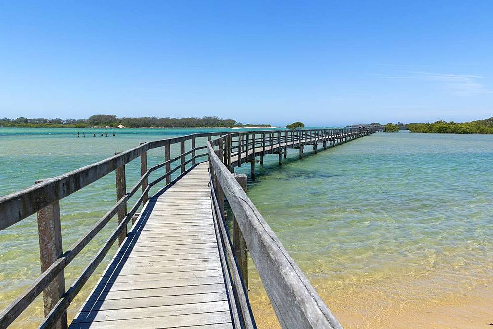 Ocean boardwalk in Urunga on the Coffs Coast stretching along the banks of the Kalang and Bellinger Rivers to the Pacific Ocean, Urunga, New South Wales, Australia, Pacific