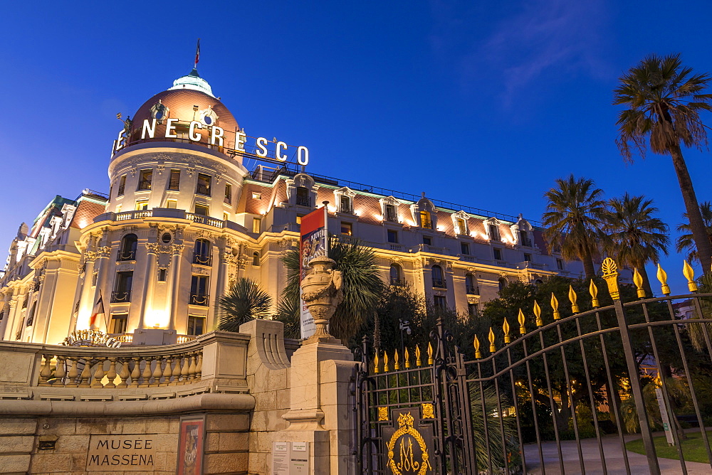 Illuminated Le Negresco Hotel building at dusk, Nice, Alpes Maritimes, Cote d'Azur, French Riviera, Provence, France, Mediterranean, Europe