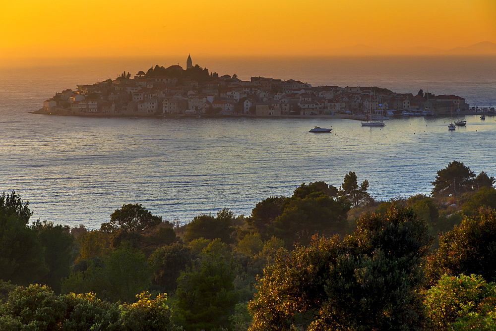 Elevated view over the old town of Primosten, situated on a small island, at sunset, Croatia, Europe