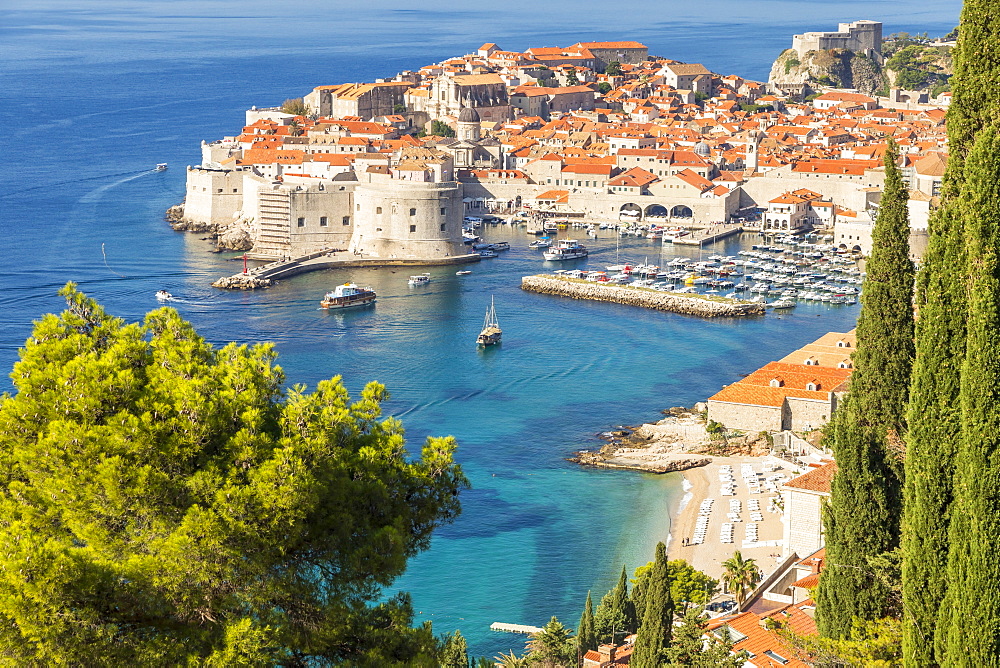 High-angle view over the old town of Dubrovnik and Banje Beach, Dubrovnik, Croatia, Europe