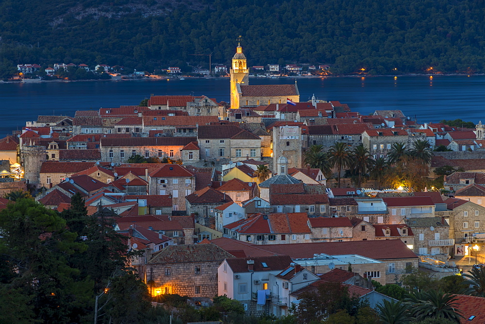 Elevated view over the old town of Korcula Town at dusk, Korcula, Croatia, Europe