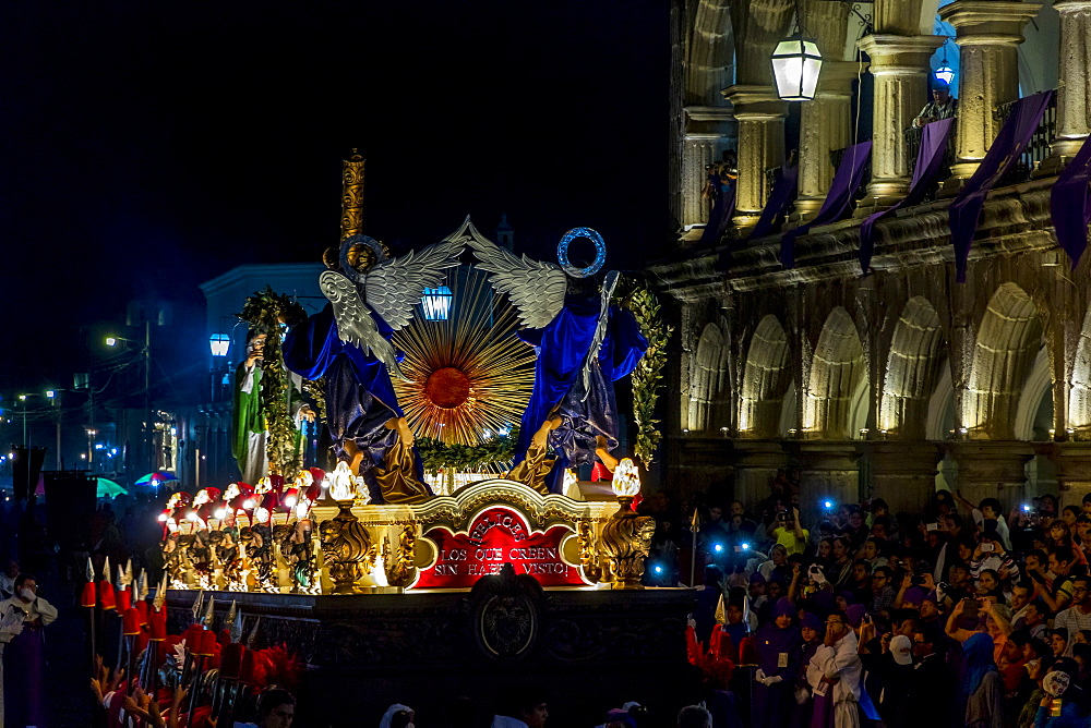 Nightly procession passing at the town hall of Antigua on Holy Thursday during the Holy Week 2017, Antigua, Guatemala, Central America