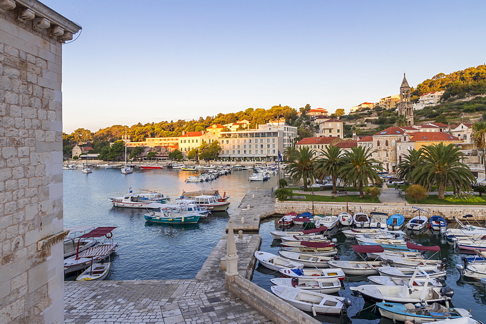 Elevated view over the port of Hvar Town at sunrise, Hvar, Croatia, Europe