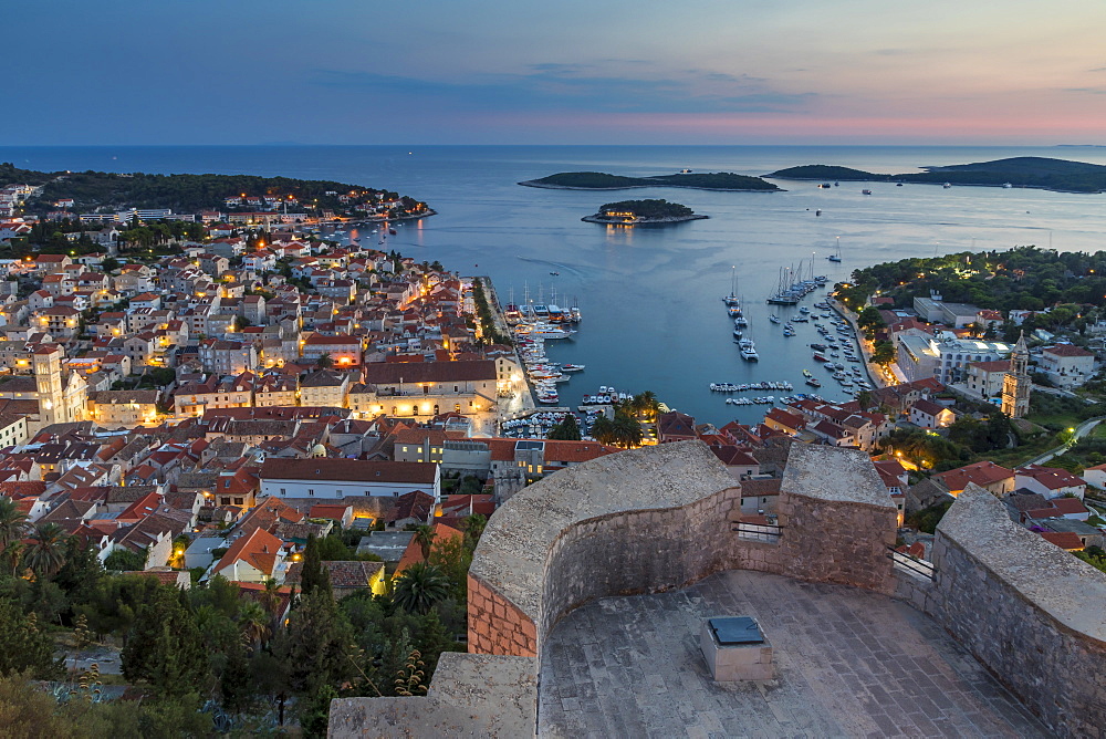 Elevated view over Hvar Town from the Spanish Fortress at dusk, Hvar, Croatia, Europe