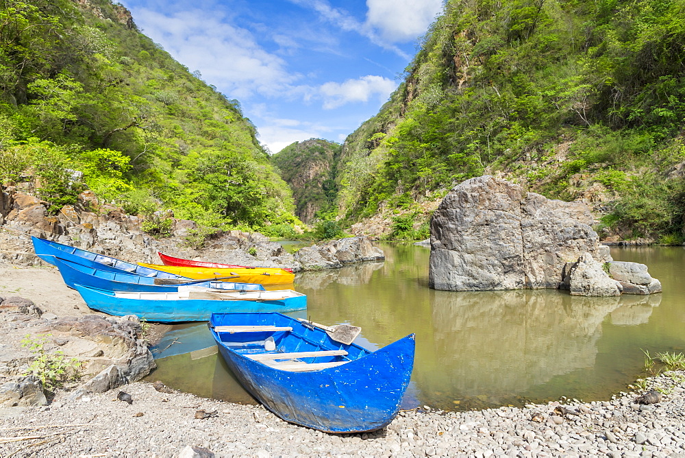 Small boats mooring at the entrance to the Somoto Canyon, Nicaragua, Central America