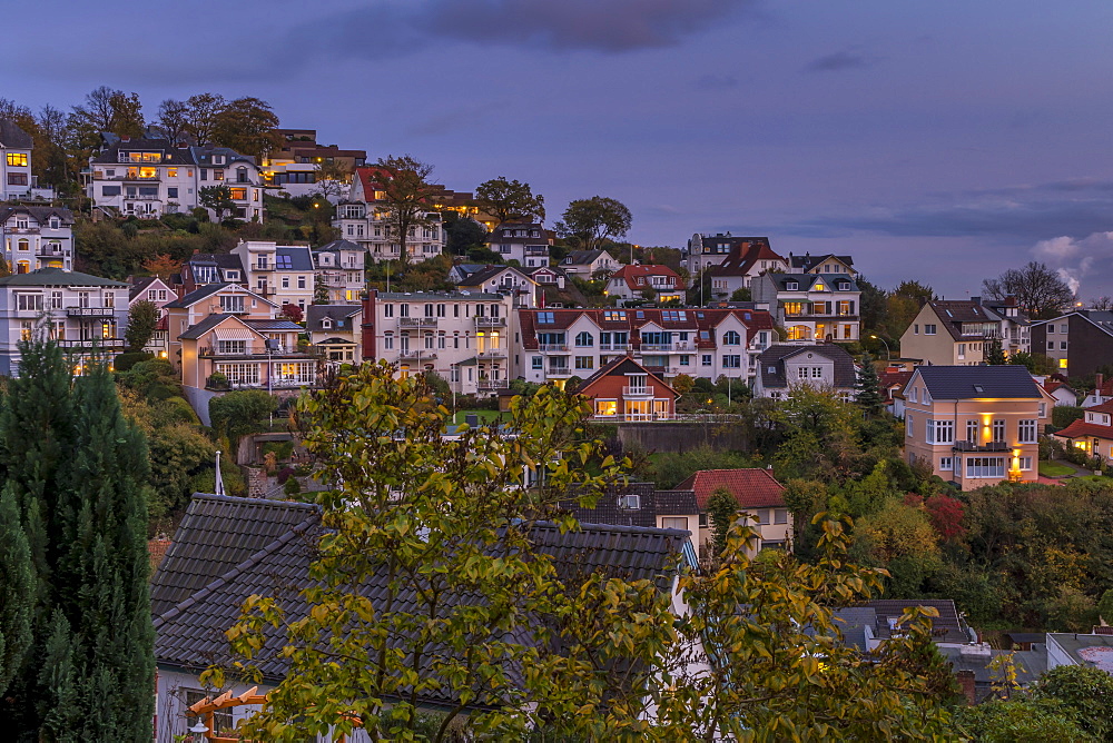 Elevated view over the mansions at the so called Treppenviertel, a quarter of the Blankenese district, at dusk, Hamburg, Germany, Europe