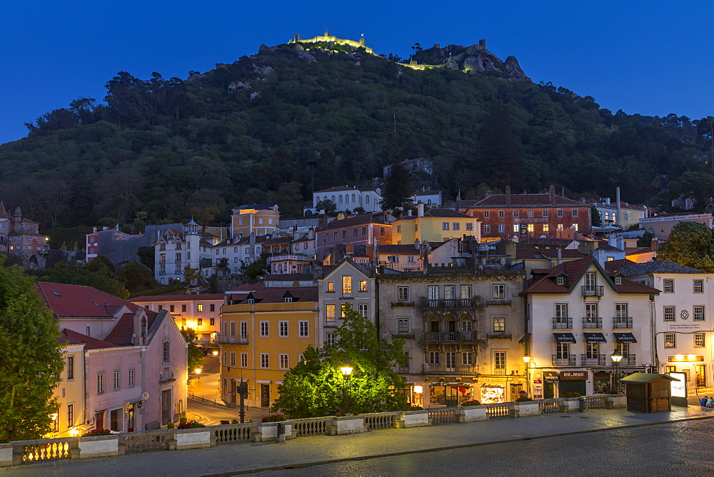 Old town of Sintra with view to the Moorish Castle atop the surrounding hills at dusk, Sintra, Portugal, Europe