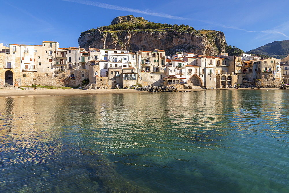 The old town of Cefalu with Rocca di Cefalu in the background, Cefalu, Sicily, Italy, Europe