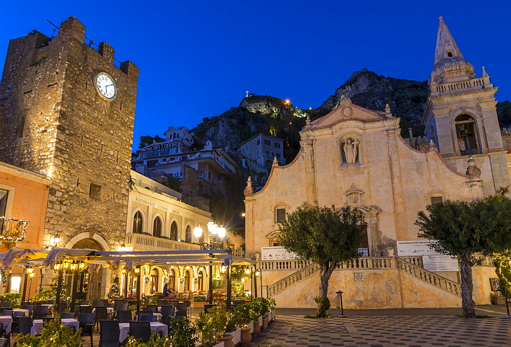 San Guiseppe church and the clock tower gate at Piazza IX Aprile during blue hour, Taormina, Sicily, Italy, Europe