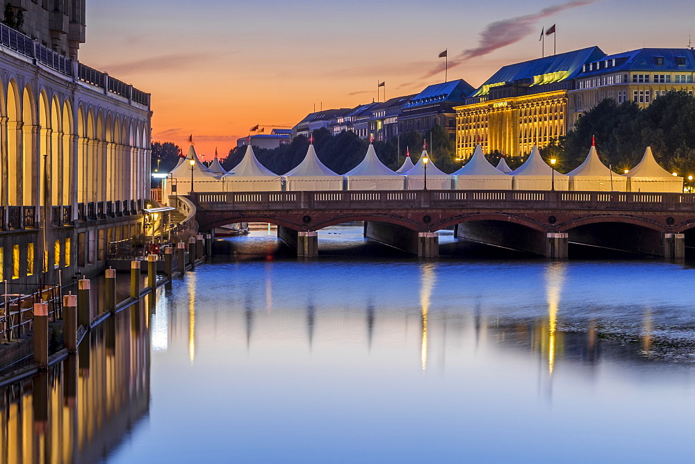 View from the town hall square to the Alsterarkaden, Reesendammbrucke and the Hapag Lloyd Building at dawn, Hamburg, Germany, Europe