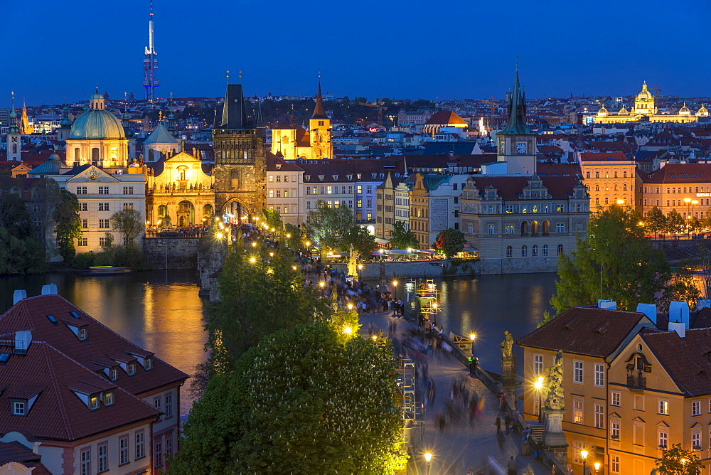 View from the Mala Strana Bridge Tower over Charles Bridge and the old town at dusk, UNESCO World Heritage Site, Prague, Bohemia, Czech Republic, Europe